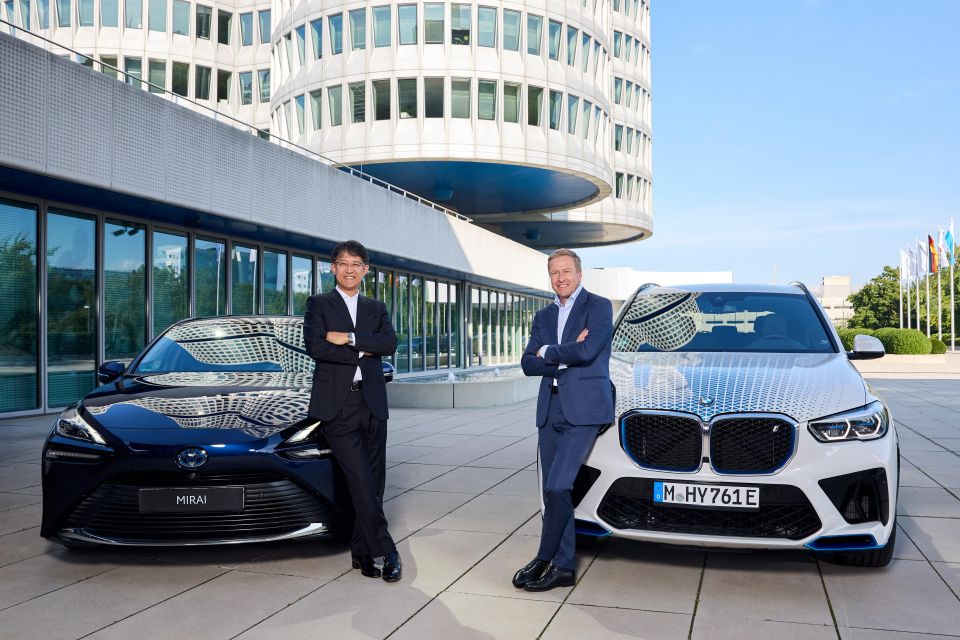 Toyota president Koji Sato and Oliver Zipse, chairman of the management board of BMW