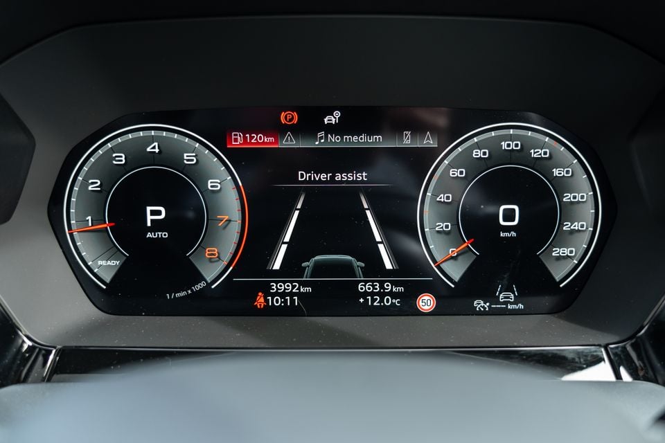 Digital instrument cluster of a 2026 Audi A3 sedan showing driver assist display, speedometer, tachometer and trip information