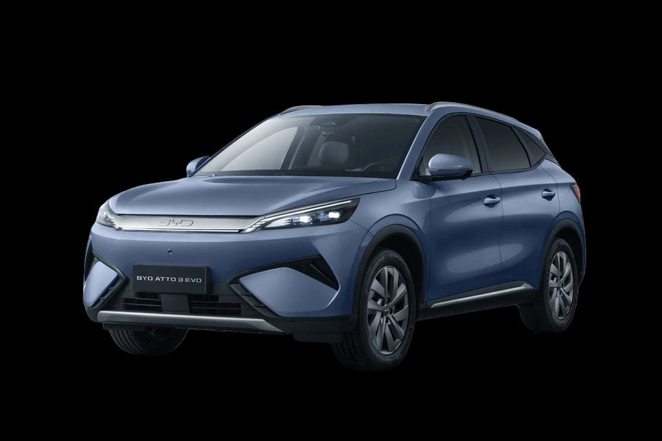 A blue-grey 2026 BYD Atto 3 EVO SUV shown from the front-side angle against a dark background