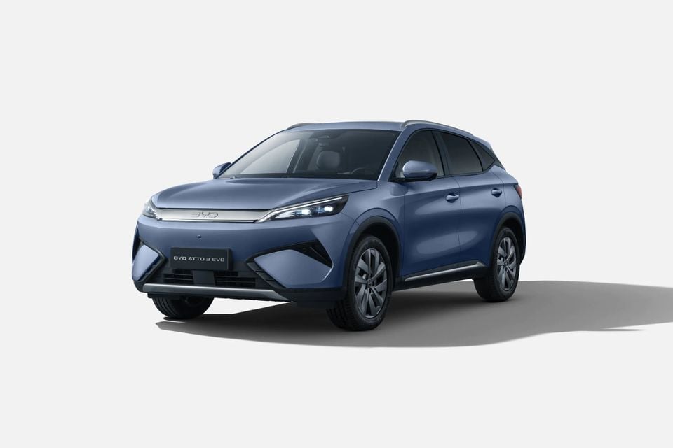 BYD Atto 3 EVO SUV in Atlantis Grey, seen from the front-side angle on a white background