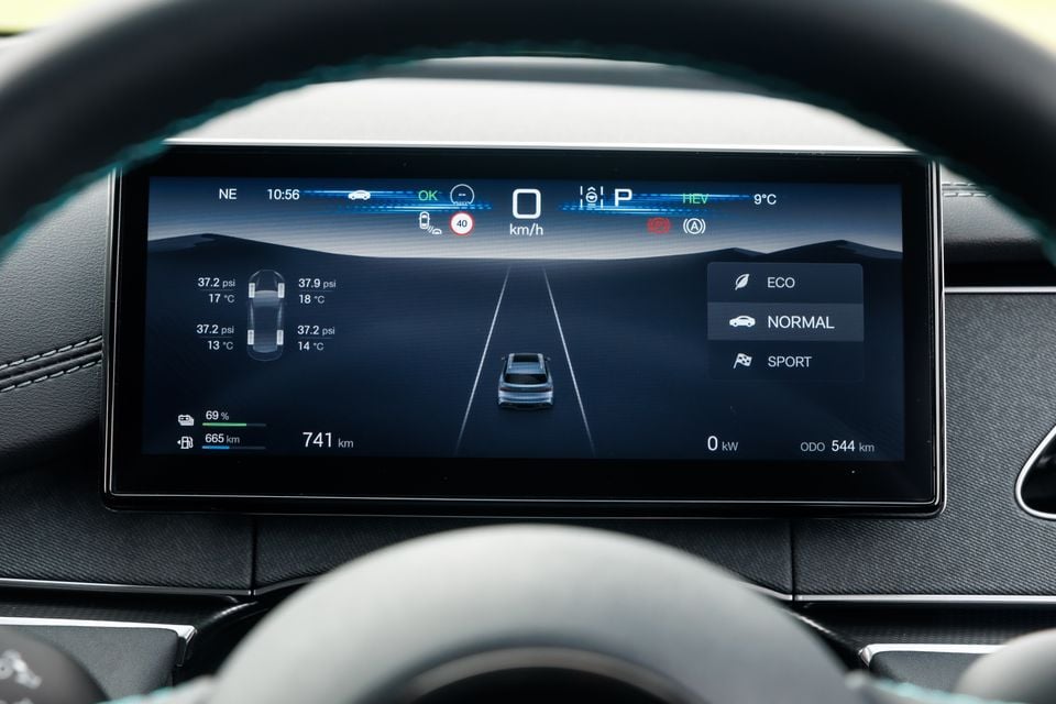 The digital instrument cluster of a 2026 BYD Seal 6 Touring showing tyre pressure readings, driving mode options (Eco, Normal, Sport), HEV status, range of 741km, and lane-keeping display