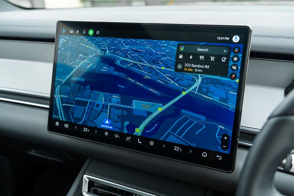 A large touchscreen infotainment display in a BYD Sealion 8 showing Google Maps navigation of Melbourne, with a destination of 303 Bambra Rd shown as 31 minutes and 18 km away.