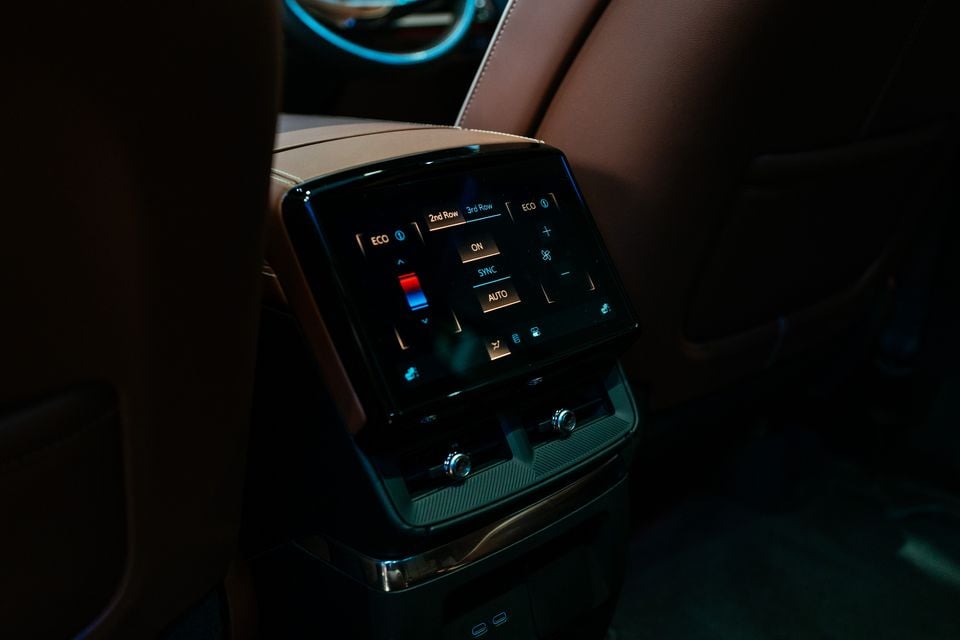 Rear climate control touchscreen panel in the 2026 Cadillac Vistiq Platinum, showing 2nd and 3rd row temperature controls with ECO, ON, SYNC and AUTO options