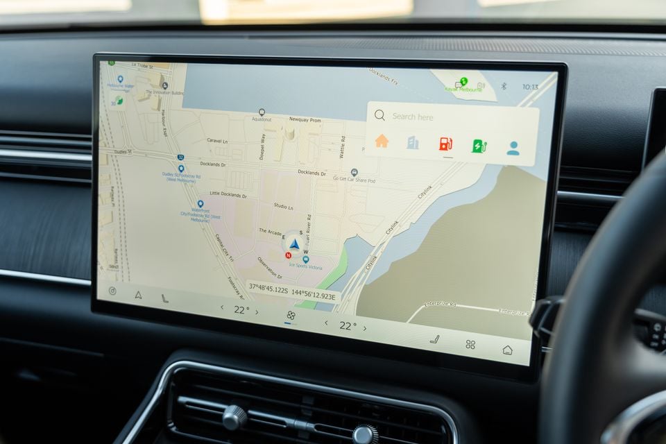 In-car touchscreen infotainment display showing a navigation map of the Melbourne Docklands area in a 2026 Chery Tiggo 9 Super Hybrid