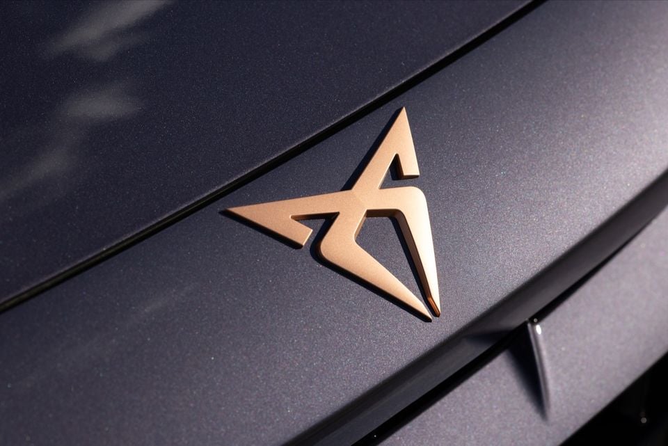 Close-up of the copper CUPRA badge on the bonnet of a 2026 CUPRA Formentor VZe PHEV