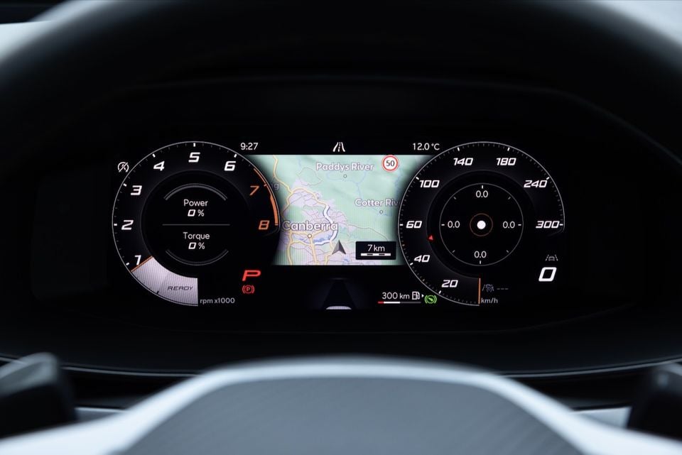 Digital instrument cluster of the 2026 Cupra Formentor VZX showing tachometer, speedometer up to 300km/h, navigation map centred near Canberra, power and torque readouts, and a 300km range indicator