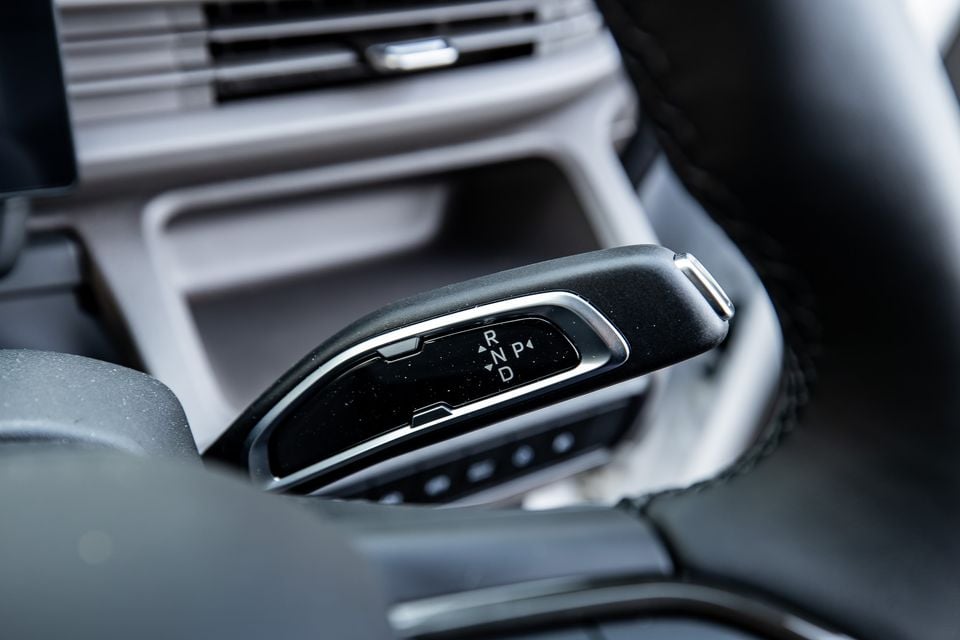 Close-up of the gear selector stalk inside the 2026 Farizon V7E, showing R, N, D and P positions