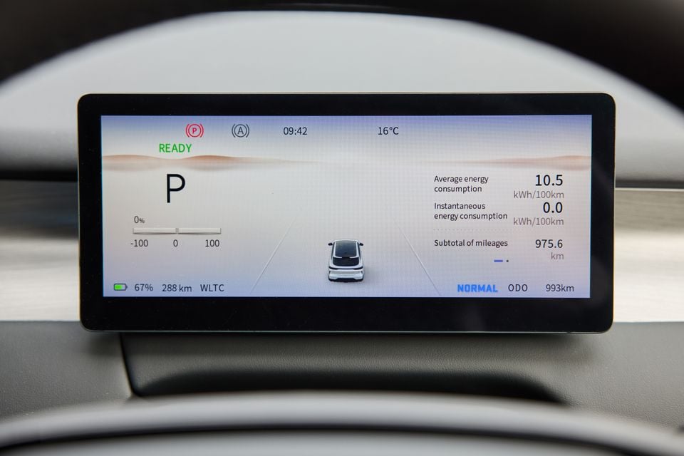 The digital instrument cluster of a 2026 Forthing Taikon 5 electric vehicle showing battery level at 67%, 288km of estimated range, energy consumption data, and odometer reading of 993km