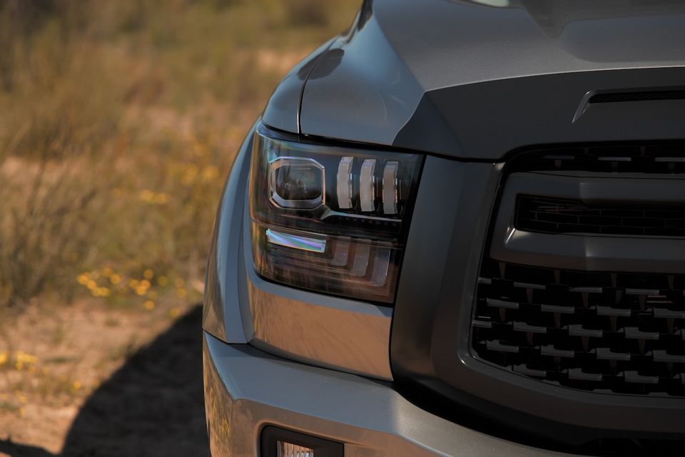 Close-up of the headlight and grille on a grey 2026 GWM Cannon Alpha 30TD ute