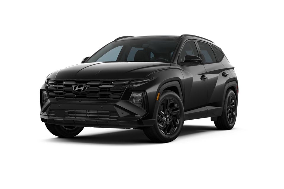 A black 2026 Hyundai Tucson SUV seen from the front three-quarter angle on a white background