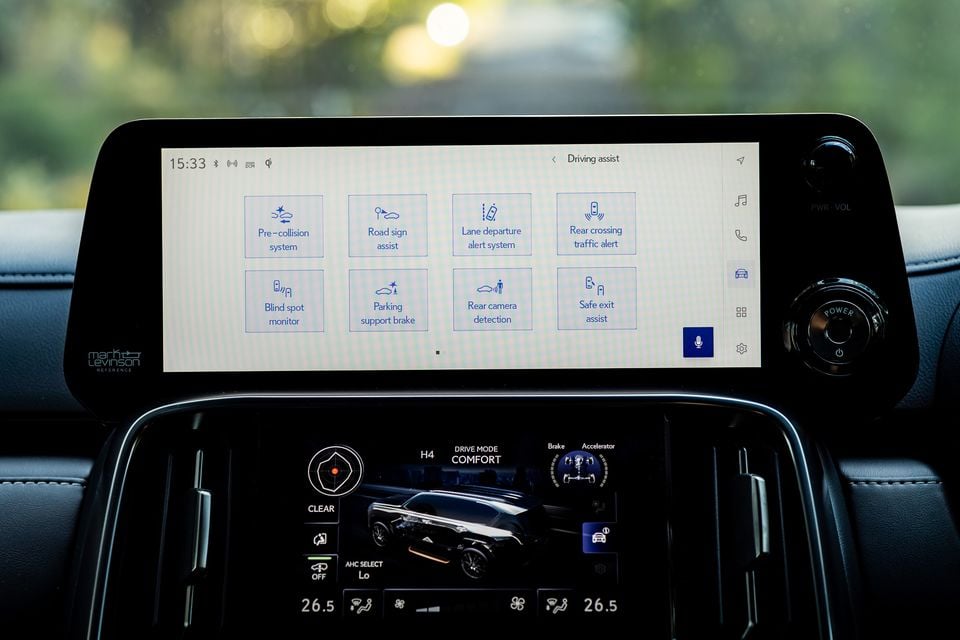 Lexus LX700h infotainment screen showing the Driving Assist menu, with a lower display screen showing Comfort drive mode settings