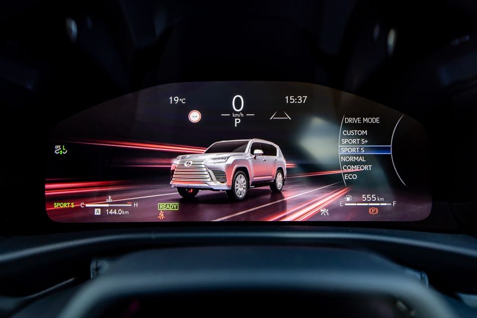 Digital instrument cluster of the 2026 Lexus LX700h Sports Luxury showing drive mode selection on Sport S, speed, fuel range of 555km, and a 3D render of the SUV