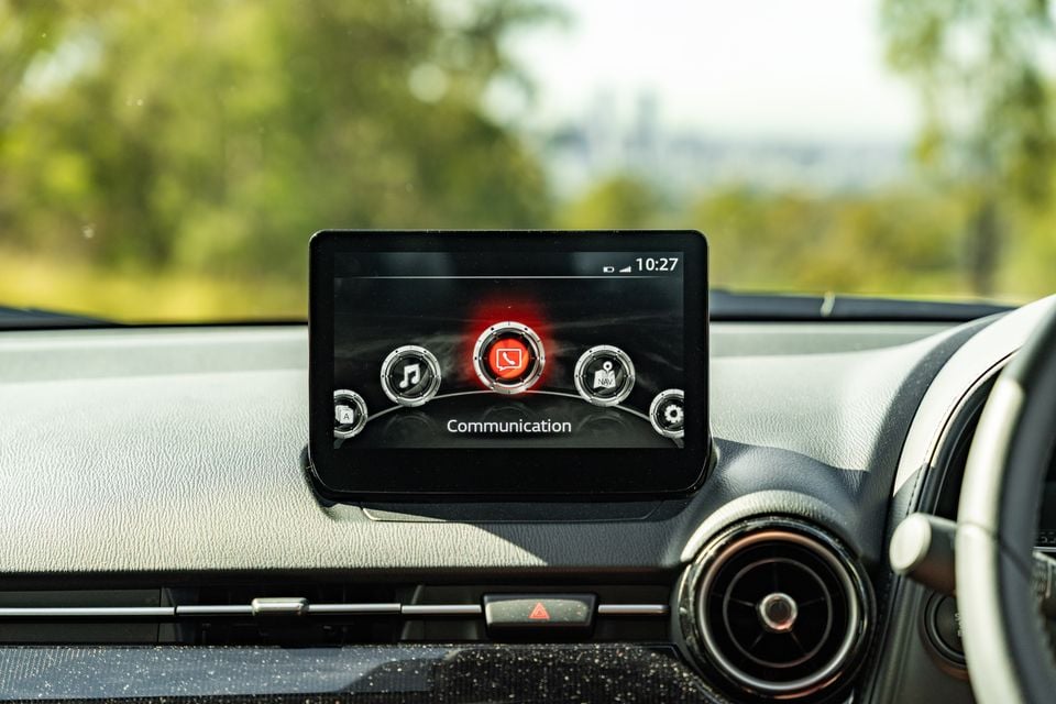 The Mazda CX-3 infotainment screen showing the Communication menu on the centre dashboard
