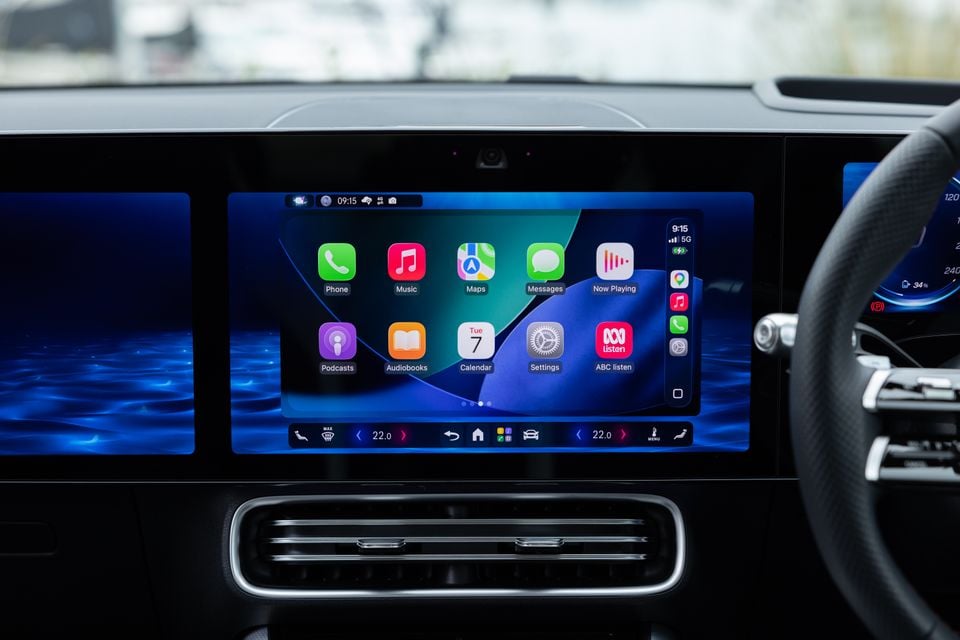 Apple CarPlay interface displayed on the central infotainment touchscreen of a 2026 Mercedes-Benz CLA 250 Electric, showing apps including Phone, Music, Maps, Messages, Podcasts, and ABC listen