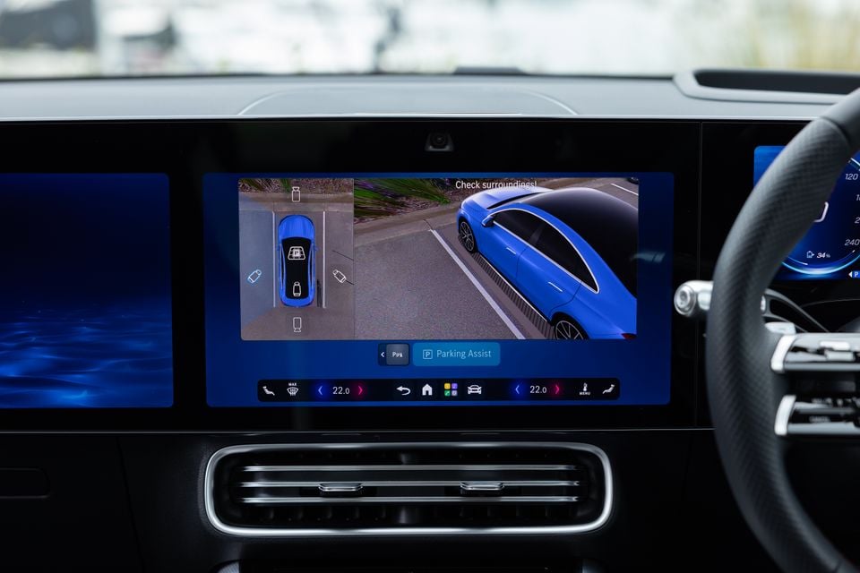 The infotainment screen of a 2026 Mercedes-Benz CLA 250 Electric showing the Parking Assist feature with a 360-degree surround view camera display