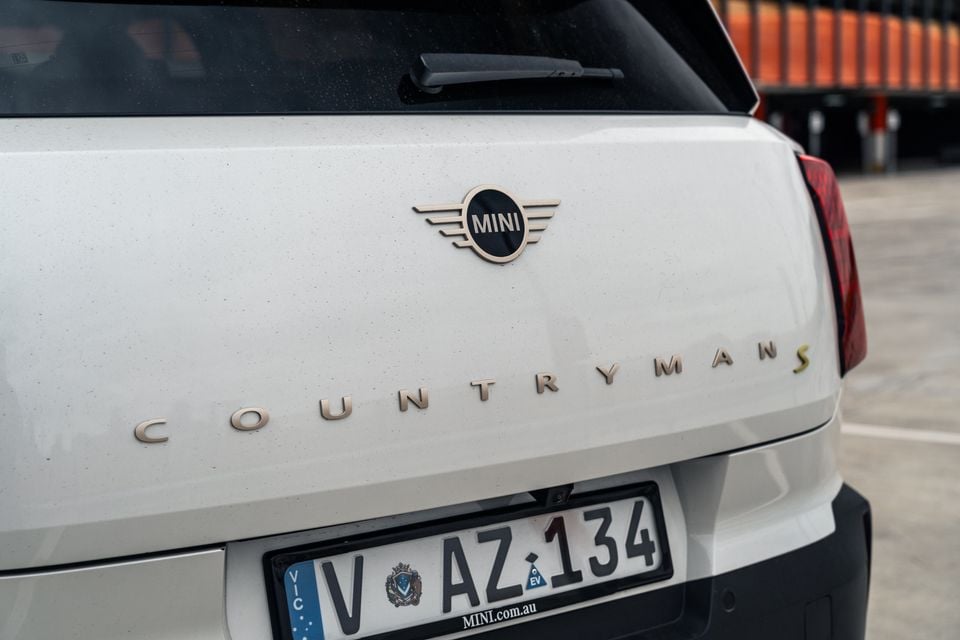 Close-up of the rear of a white Mini Countryman S showing the model badge and Victorian number plate