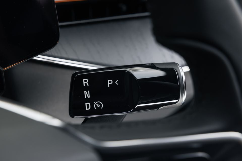 Close-up of the gear selector stalk in a 2026 Polestar 3, showing R, N, D and P positions