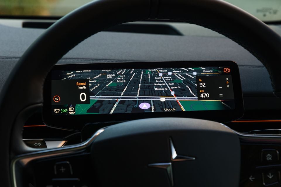 Polestar 3 digital instrument cluster showing a Google Maps navigation display, speedometer reading zero, and battery range of 470km