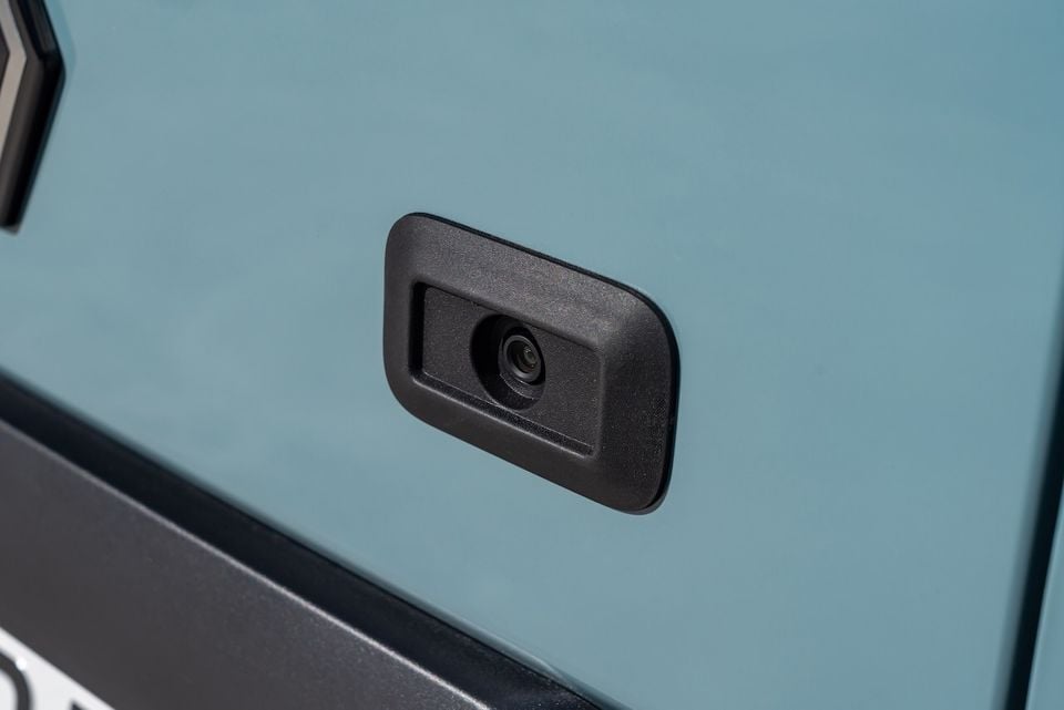 Close-up of the reversing camera mounted on the rear tailgate of a 2026 Renault Master van