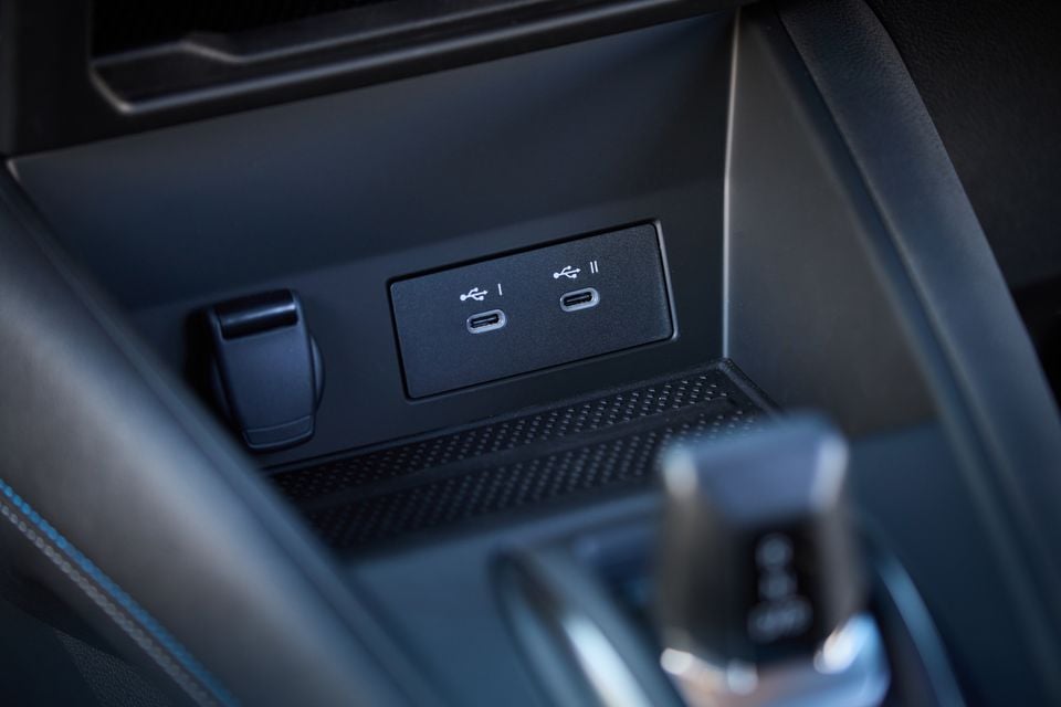 Two USB-C ports in the centre console storage area of a 2026 Renault Symbioz Esprit Alpine