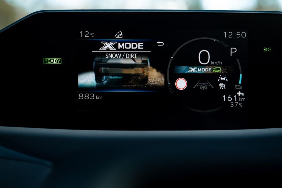 Subaru X-Mode Snow/Dirt setting displayed on the digital instrument cluster of a 2026 Subaru, showing 0 km/h speed, 37% battery, and 161 km of range remaining