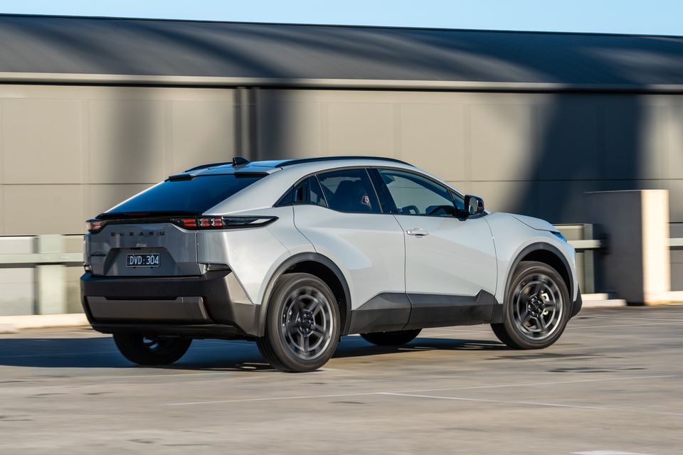 A silver 2026 Subaru Uncharted SUV seen from the rear three-quarter angle in a car park