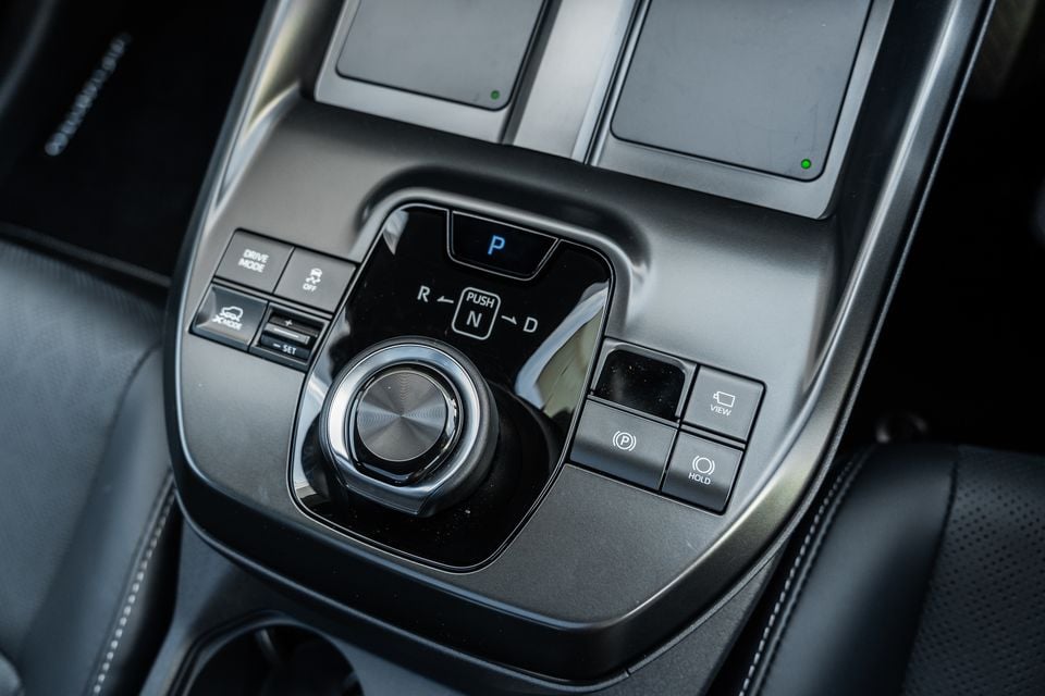 Close-up of the centre console gear selector and drive mode controls inside a Subaru, showing the electronic gear shifter in Park with X-Mode, Drive Mode, and hold buttons visible