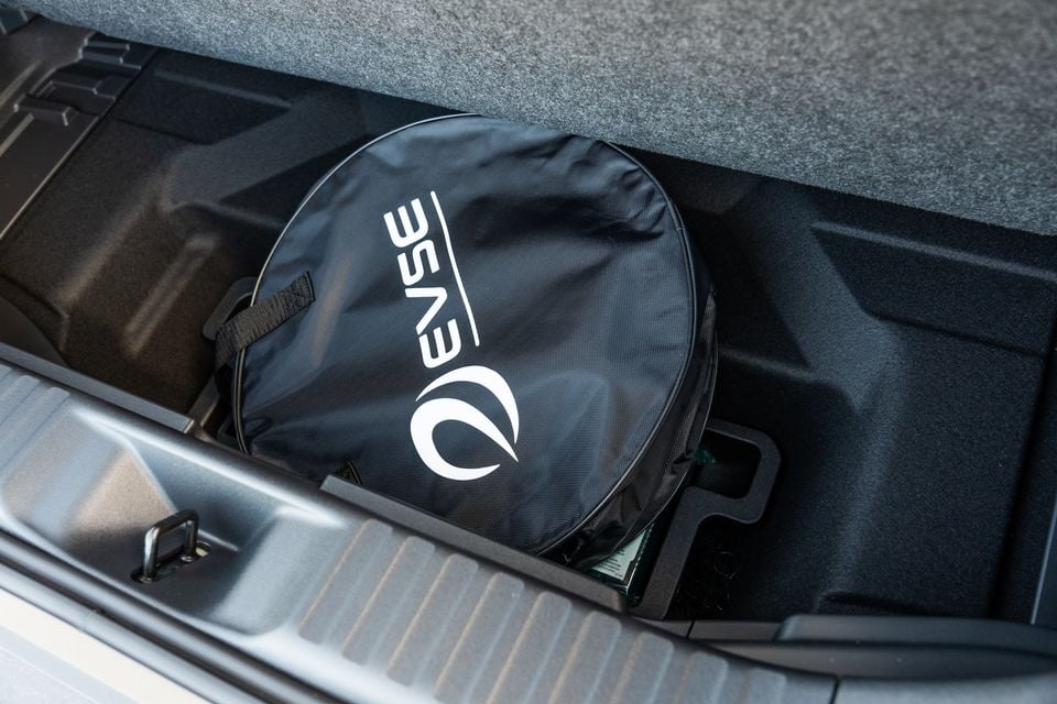 An EVSE charging cable bag stored in the under-floor boot storage compartment of a 2026 Subaru Outback