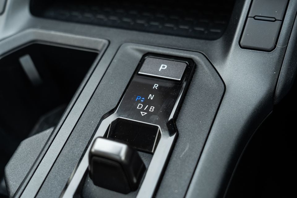Close-up of the electronic gear selector and centre console in a 2026 Toyota RAV4 Cruiser, showing the P, R, N, D/B shift buttons.