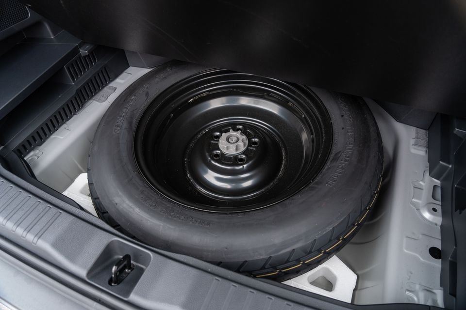 A temporary spare wheel and tyre stored under the boot floor of a 2026 Toyota RAV4 Cruiser