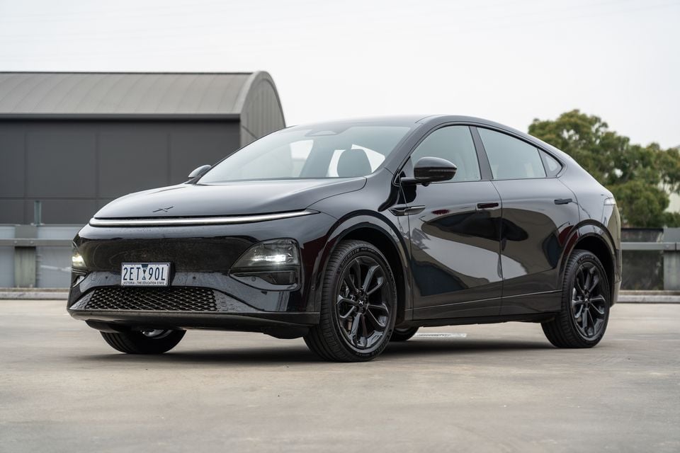 A black 2026 Xpeng G6 AWD Performance Black Edition SUV seen from the front-left side, parked on a concrete surface in Victoria, Australia