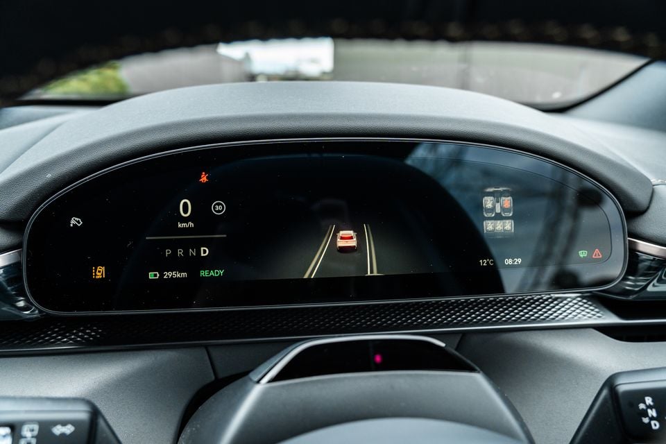 Digital instrument cluster of the 2026 Zeekr 7X showing speed, 295km range, drive mode selector and a bird's-eye road view graphic