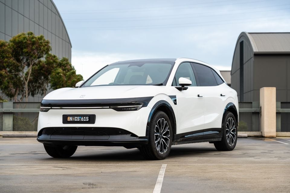A white 2026 Zeekr 7X SUV seen from the front three-quarter angle in a car park