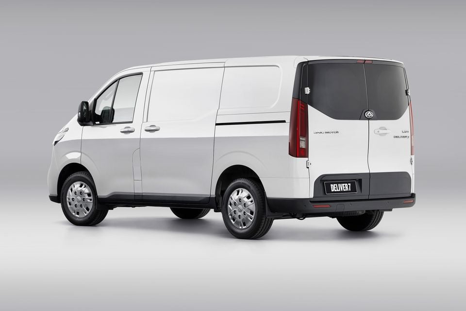 LDV Deliver 7 panel van in white, seen from the rear three-quarter angle in a studio setting