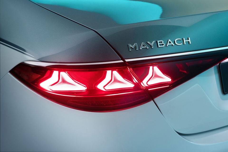 Close-up of the illuminated rear tail light and Maybach badge on a 2026 Mercedes-Maybach.