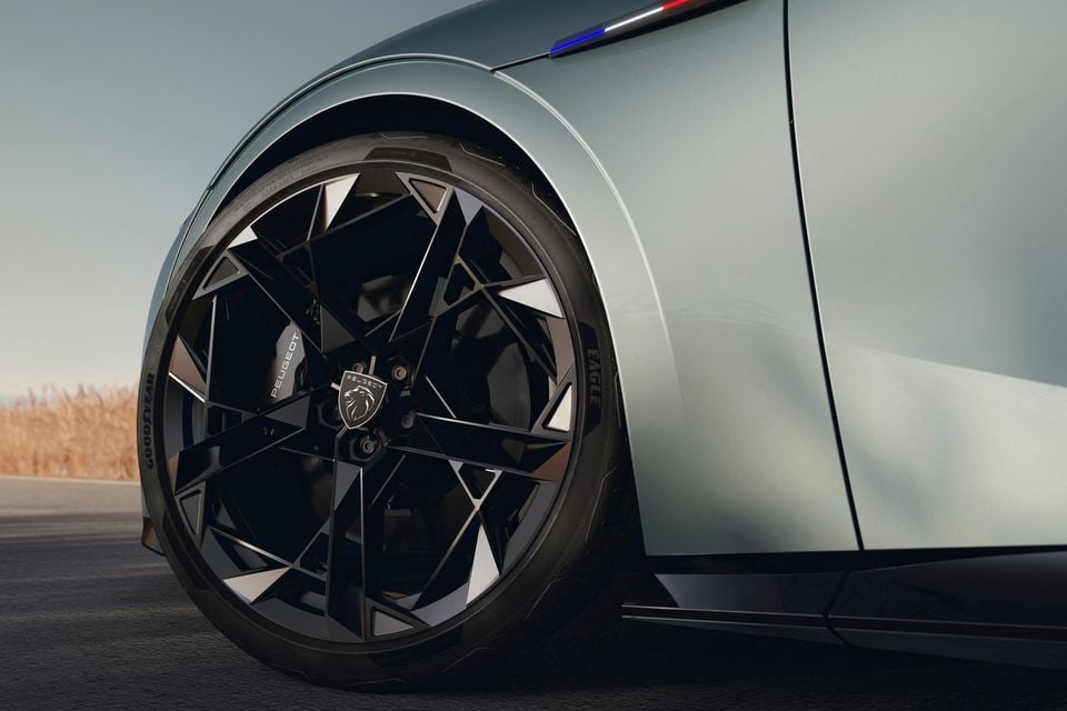 Close-up of the Peugeot Vision RCZ concept's black angular alloy wheel with lion centre cap, Goodyear Eagle tyre and branded brake caliper