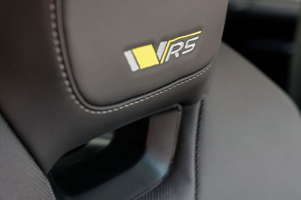 RS-branded leather headrest embroidery on a seat inside a Skoda Enyaq RS