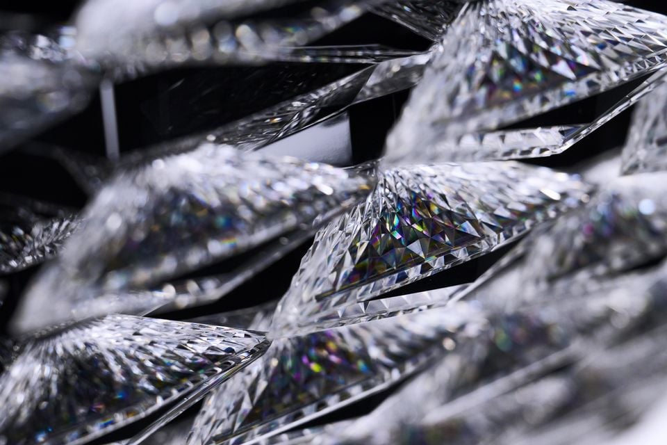 Close-up of faceted crystal elements with rainbow light refractions, appearing to be decorative trim detail from the Bentley Torcal concept car