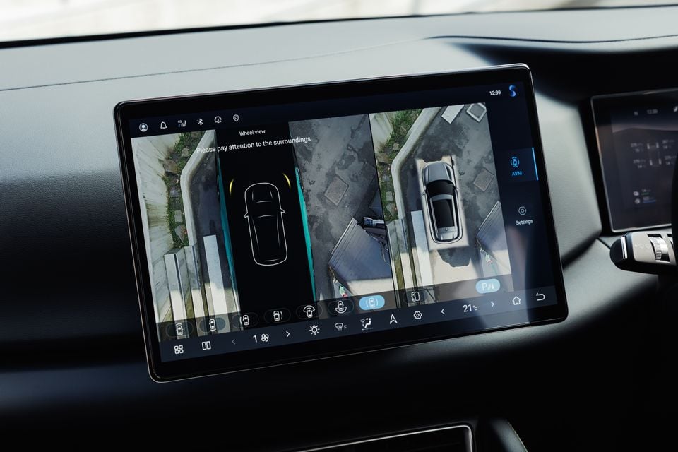 A close-up of the infotainment touchscreen in a BYD Atto 2 showing the 360-degree camera surround view display
