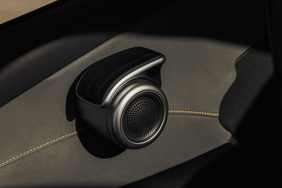Close-up of a premium speaker built into the door trim of a 2027 BYD Atto 3 Evo Premium's interior