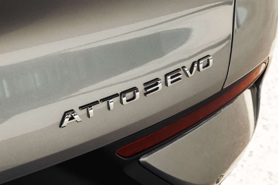 Close-up of the "Atto 3 Evo" badge on the rear of a grey BYD Atto 3 Evo