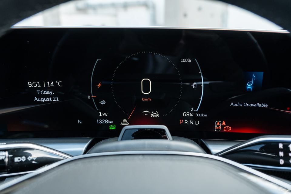 Digital instrument cluster of a Cadillac Lyriq showing speed, battery charge at 69% with 333km range, and driver assistance displays