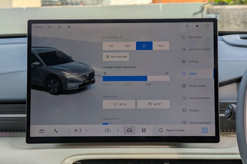The Geely GX5's touchscreen infotainment system showing the Lights settings menu, including exterior lights, headlight height adjustment, and reading lights controls