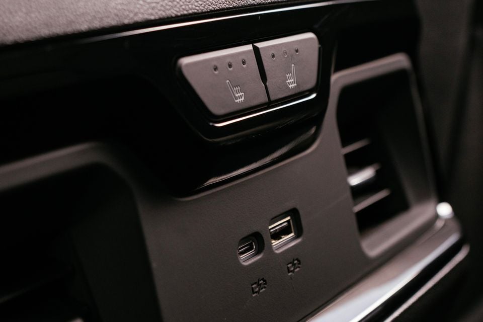 Rear seat heating buttons alongside USB-C and USB-A charging ports on the centre console of a Chevrolet Silverado ZR2