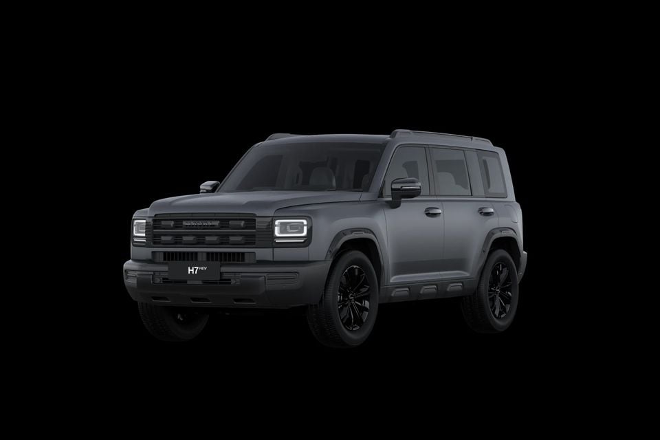 A dark grey 2027 GWM Haval H7 HEV SUV seen from the front three-quarter angle against a black background