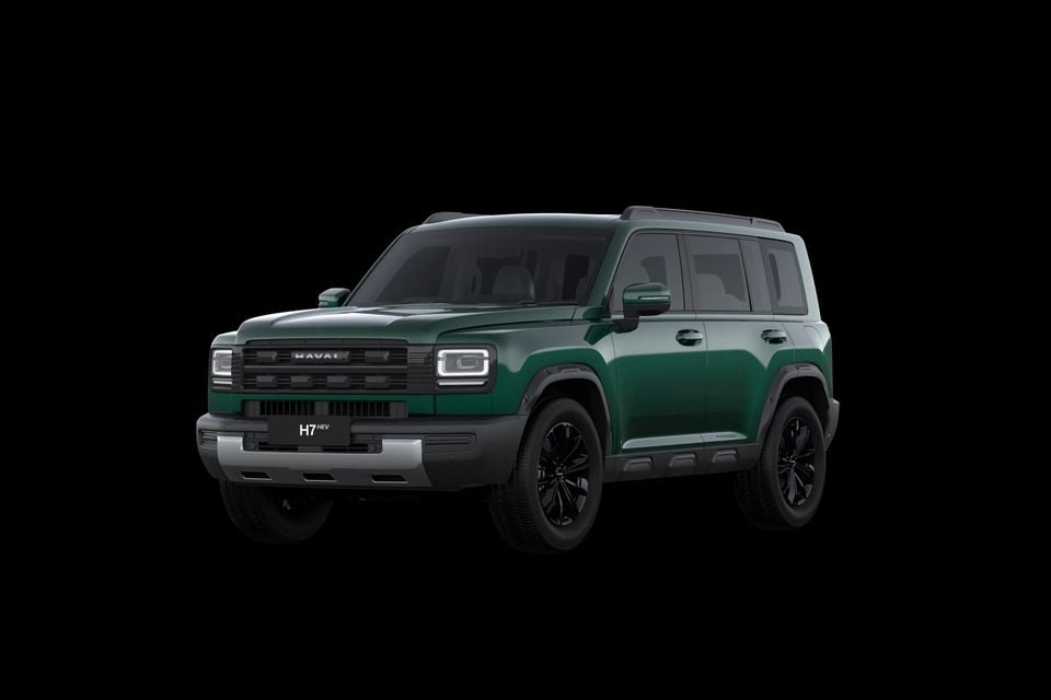 A green 2027 GWM Haval H7 HEV SUV seen from the front three-quarter angle against a black background