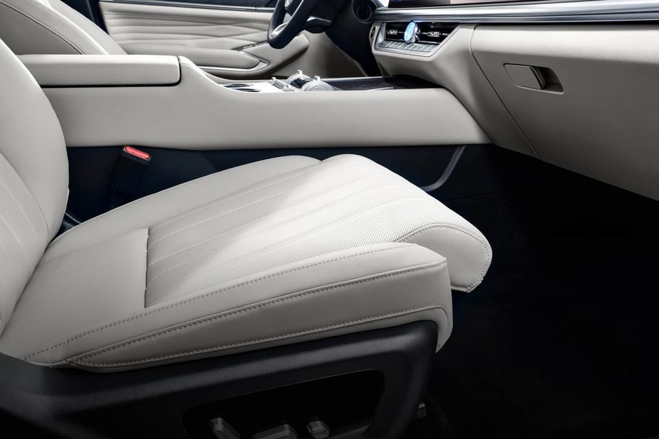 Light grey quilted leather front passenger seat and centre console inside the 2027 GWM Tank 500