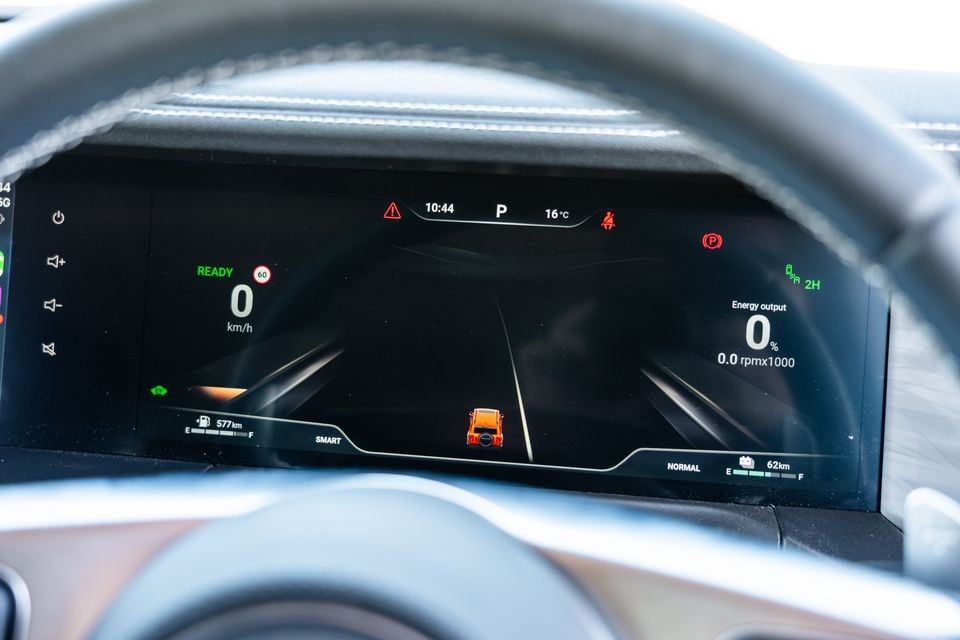 Digital instrument cluster of the GWM Tank 300 Ultra PHEV showing speed, energy output, fuel range and driver assistance displays as seen through the steering wheel