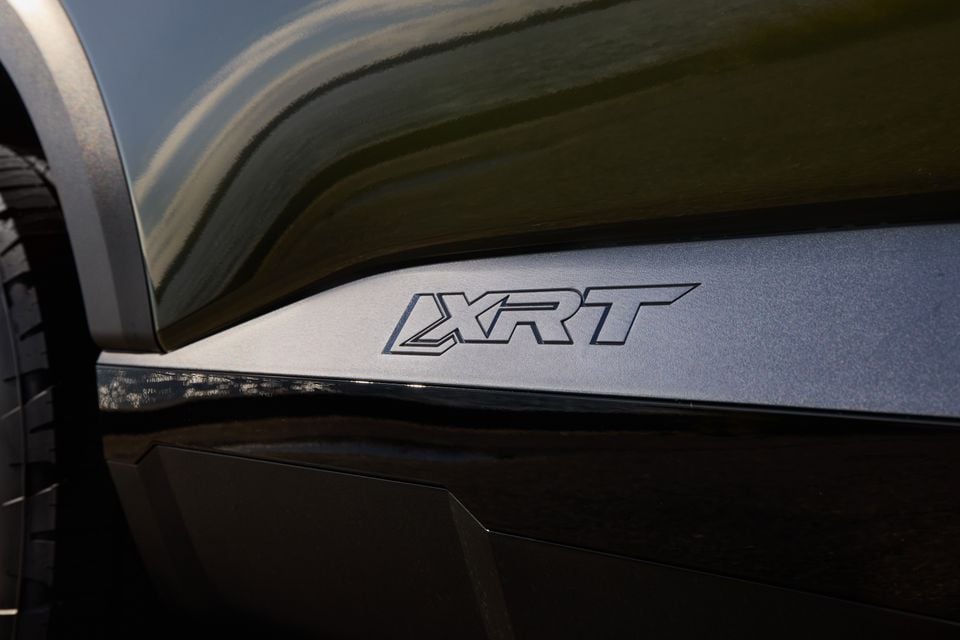 Close-up of the XRT badge on the side panel of a 2027 Hyundai Palisade XRT Pro