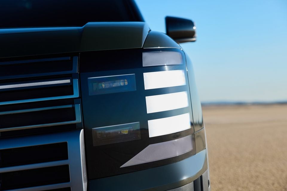 Close-up of the LED headlight and grille on a 2027 Hyundai Palisade XRT Pro, seen from the front